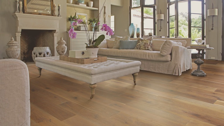 warm, honey toned hardwood flooring in a beautiful modern living room